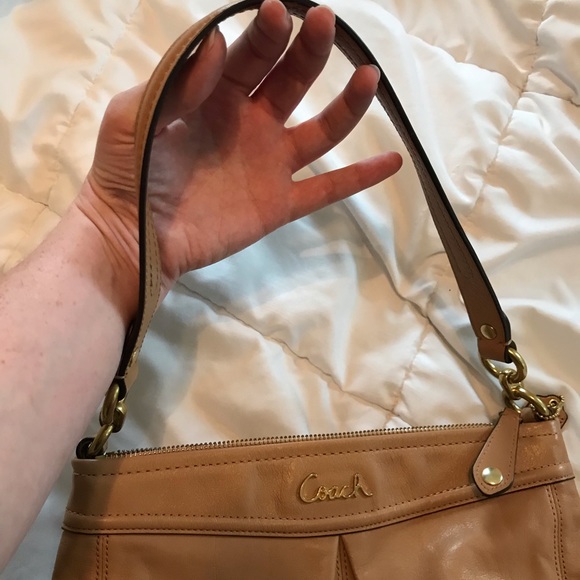Coach handbag, lightly used, now eat or tear. Light brown with gold accents. - Picture 4 of 5